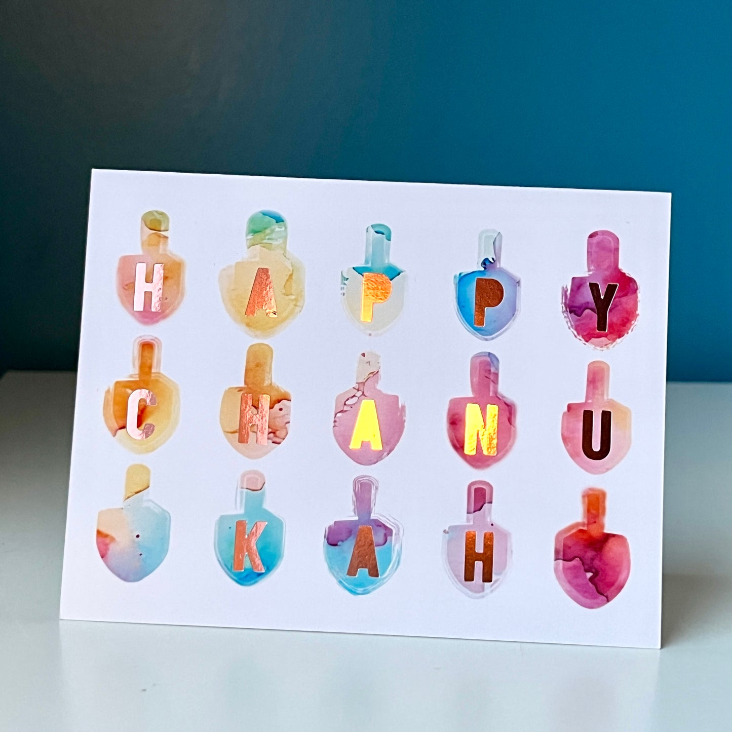 Painted Dreidels Chanukah Greeting Card