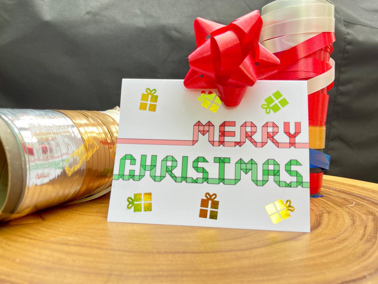 Merry Christmas Card with Ribbon and Gift Boxes